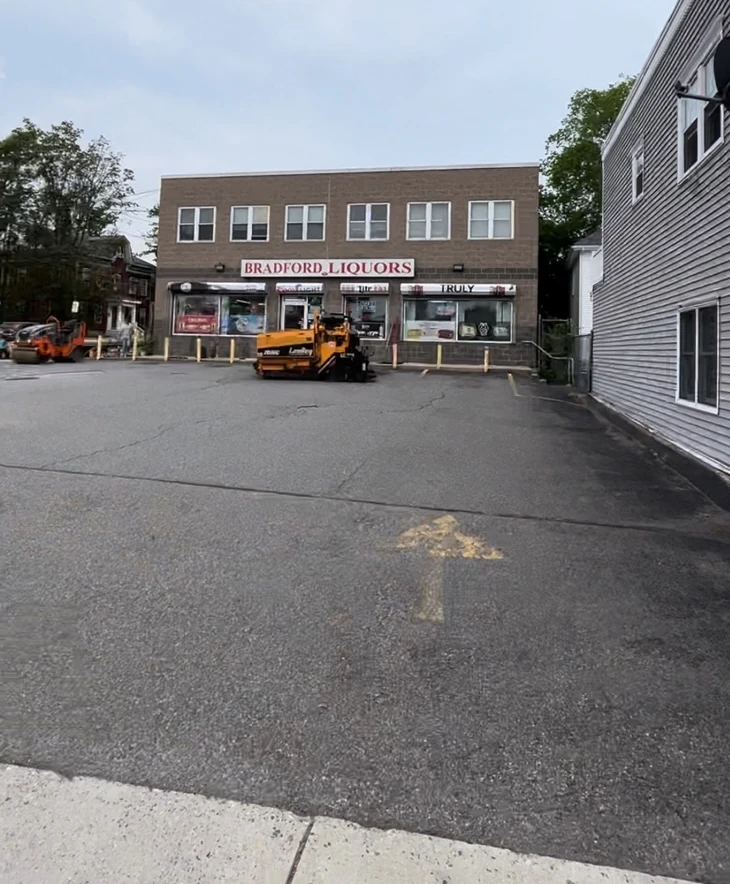Pothole repair and asphalt patching on a commercial lot in Haverhill MA